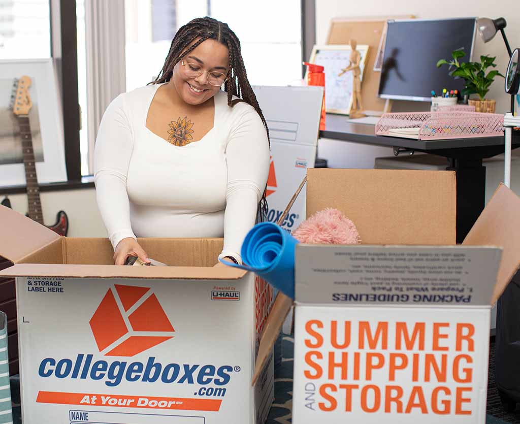 A woman begins loading items into her Collegeboxes for college. Dorm room essentials are important for success for a freshman’s first year at college.